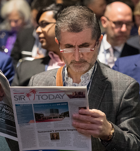Man reading SIR Today